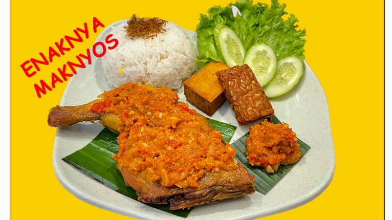 The house promo plate: ayam penyet with rice, tempeh, tofu, cucumber and sambal