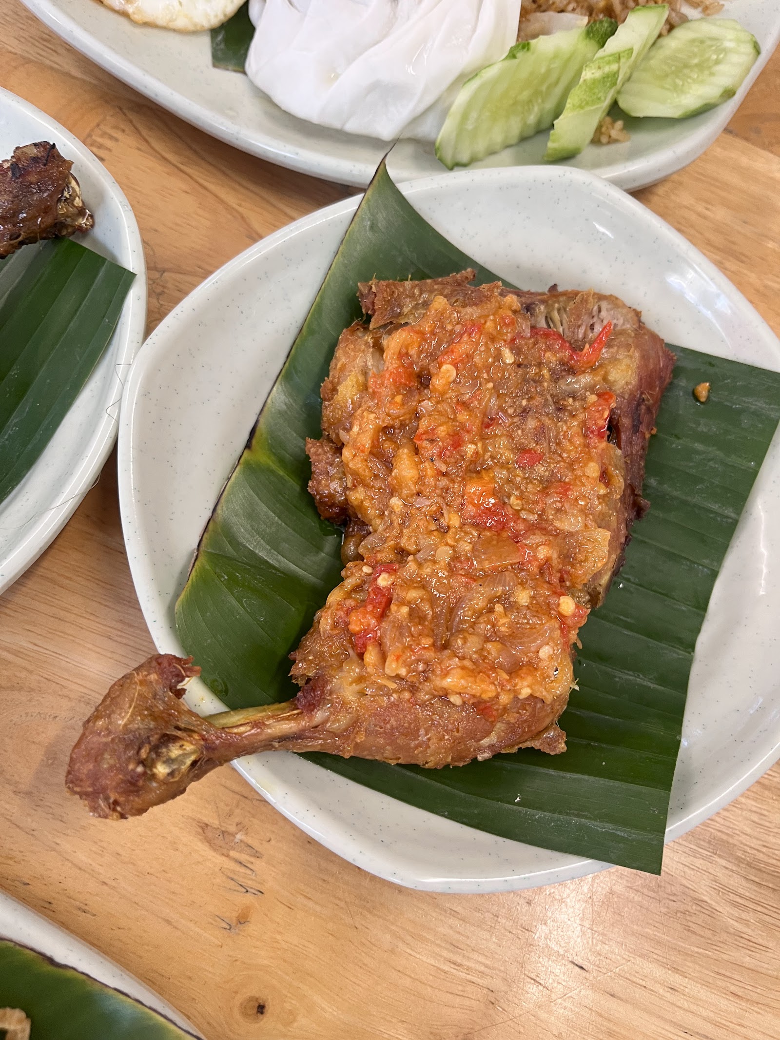 Sambal ayam penyet leg quarter on banana leaf