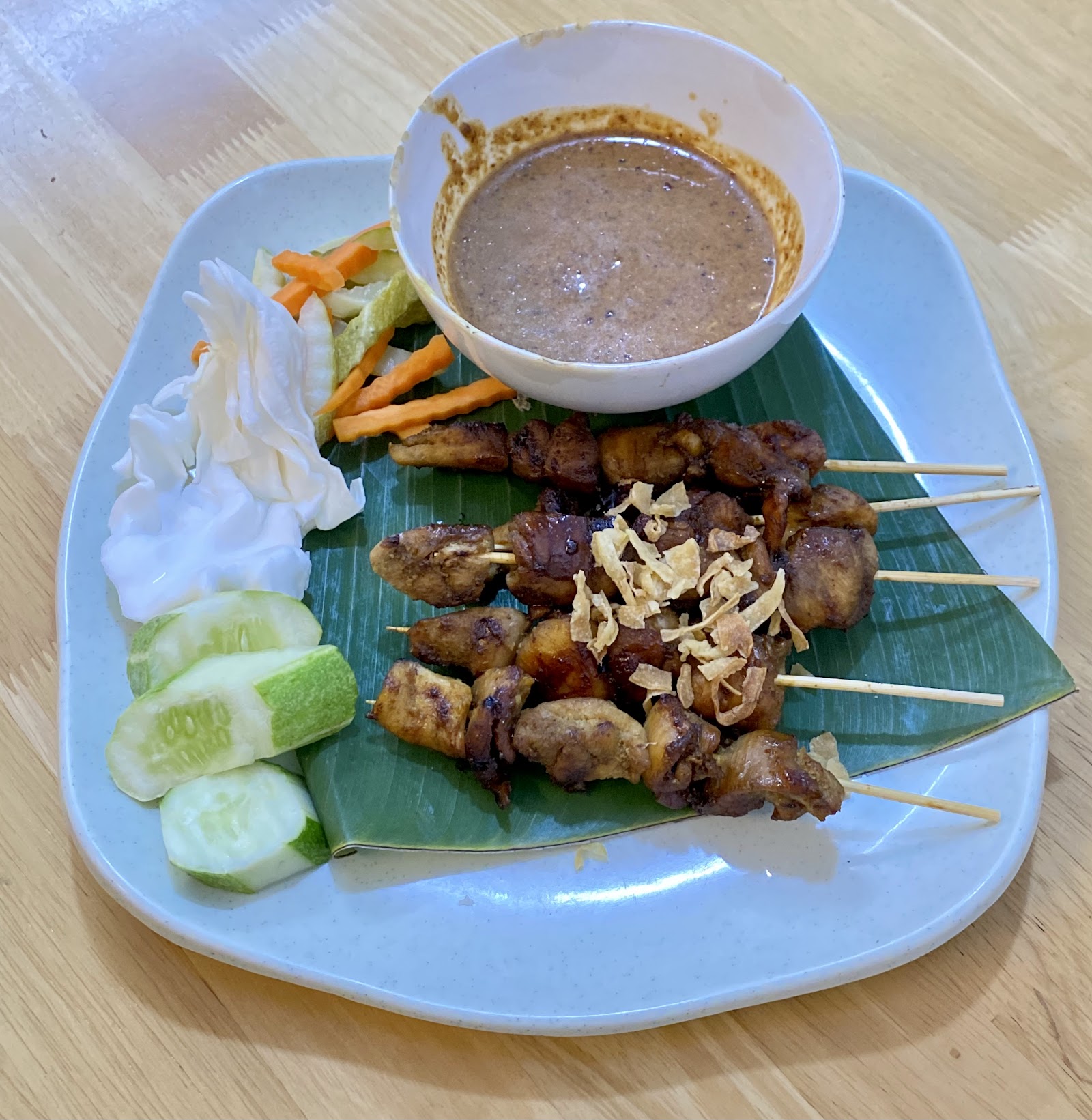 Chicken satay skewers with peanut sauce