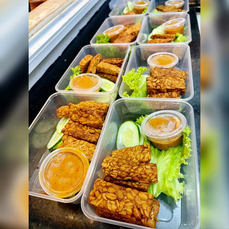 Tempeh takeaway boxes with sambal