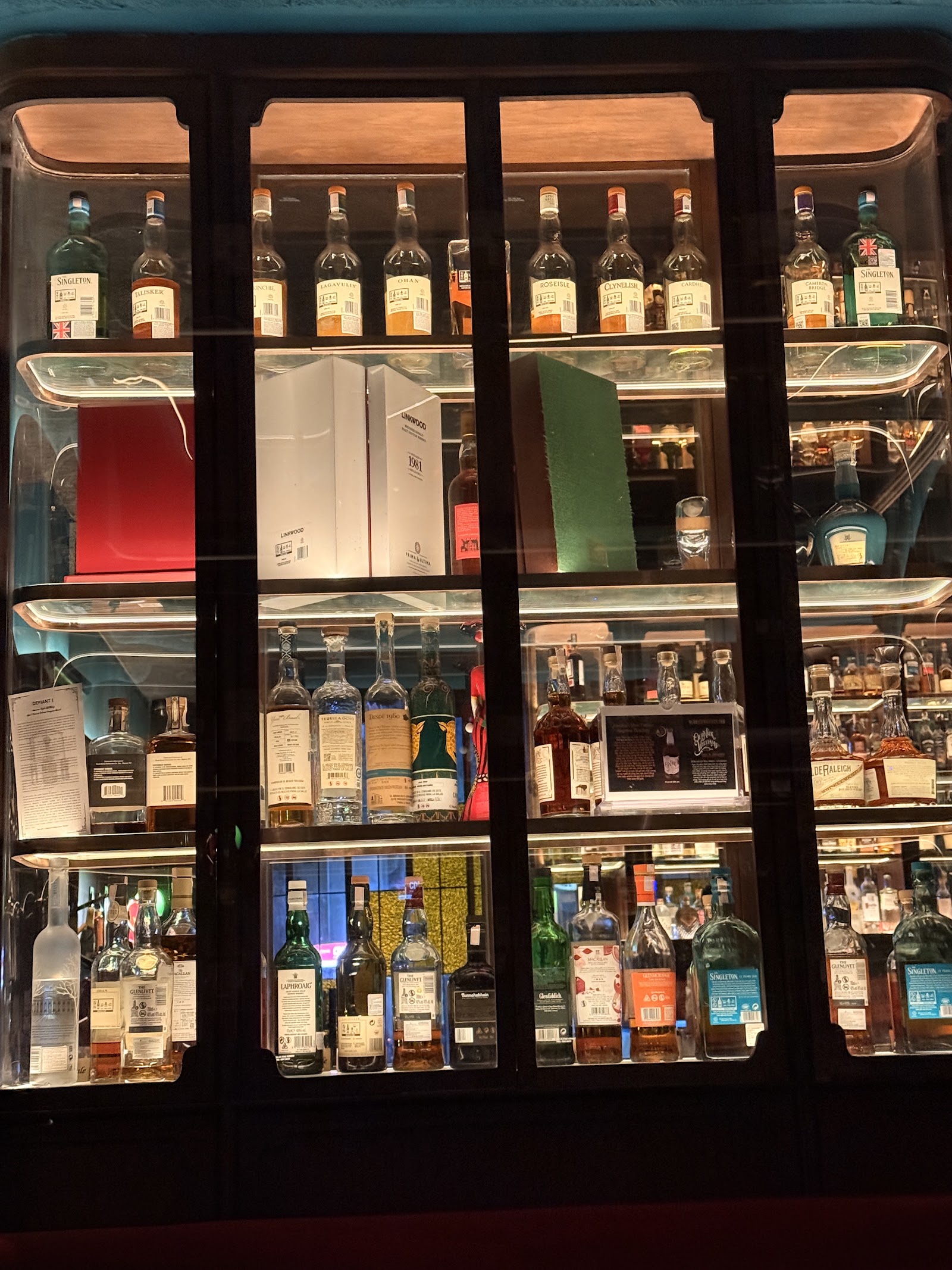 The tall, stacked whisky shelves at Whiskey Lane
